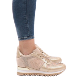 Sneakers dorate sulla zeppa G-125 d'oro