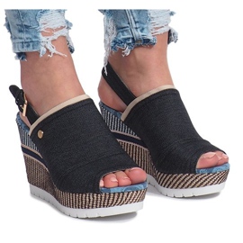 Sandali neri con zeppa mulanka jeans nero