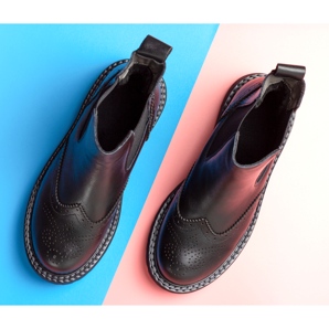 Una guida per uomini alla moda. Scopri cosa indossare con gli stivali Chelsea