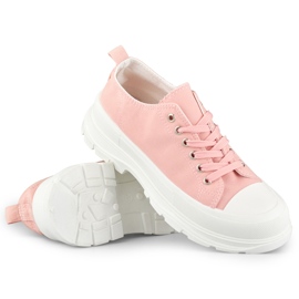 Sneakers rosa su una piattaforma bassa 1