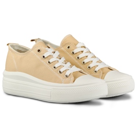 Sneakers beige su una piattaforma bassa 2