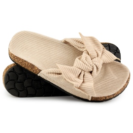 Pantofole da donna classiche in camoscio beige con fiocco 1