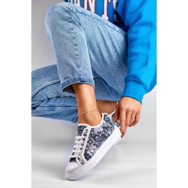 Sneakers da donna in bianco e nero 1