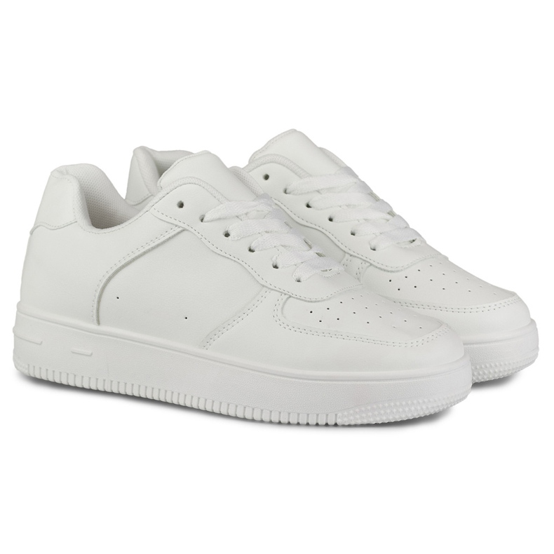 Classiche sneakers sportive bianche con suola bianca 2