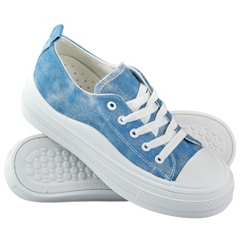 Sneakers in denim da donna sulla piattaforma blu 1