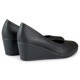 Décolleté nere sulla zeppa realizzate in ecopelle nero 1