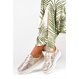 Scarpe sportive dorate da donna in vera pelle d'oro 1