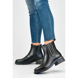 Stivali da donna neri con tacco piatto realizzati in ecopelle nero 1