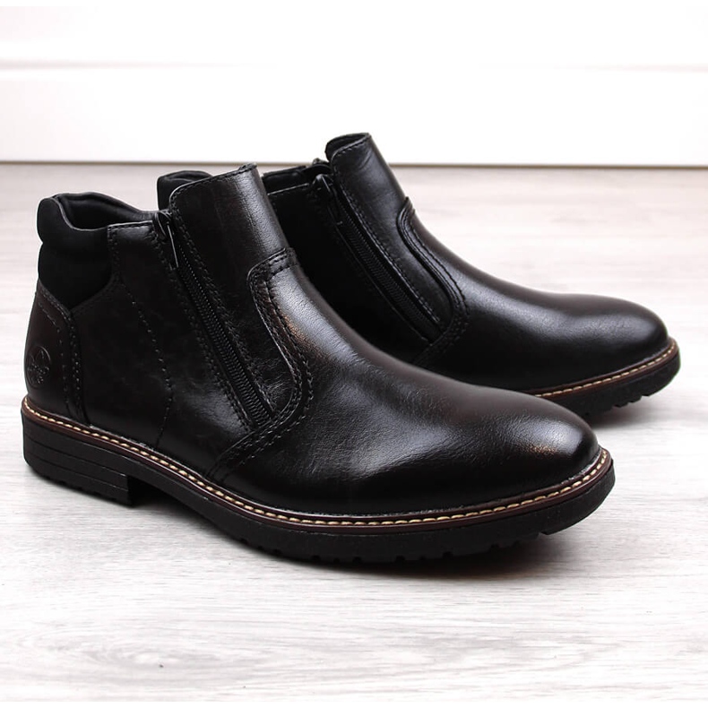 Stivaletti da uomo in pelle, foderati in lana, neri Rieker 33151-00 nero 1