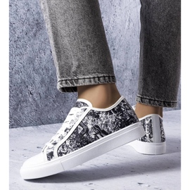 Sneaker in tessuto bianco e nero di Aucoin 1