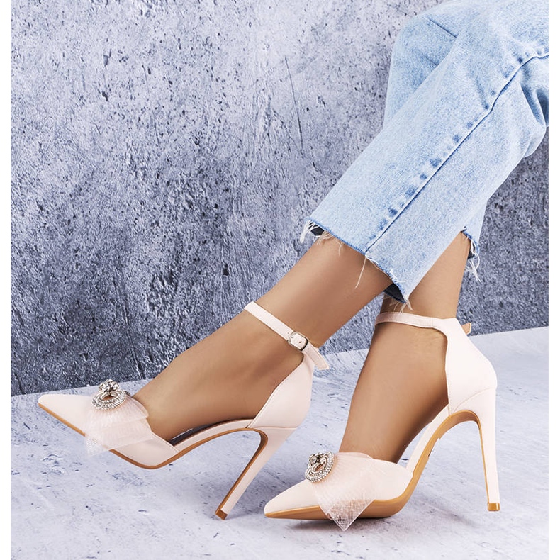 Spille beige con fiocco e zirconi di Bussi 1