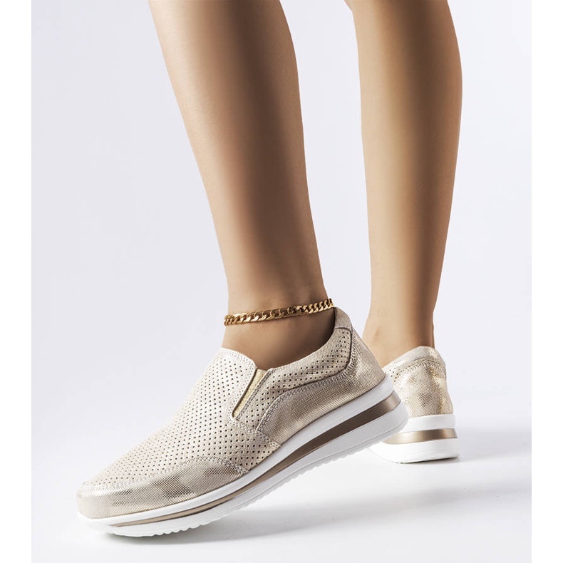 Sneaker oro con zeppa traforata di Rhéaume d'oro 1