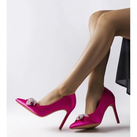 Spille rosa fluo con finitura satinata e fiocco Mia 1