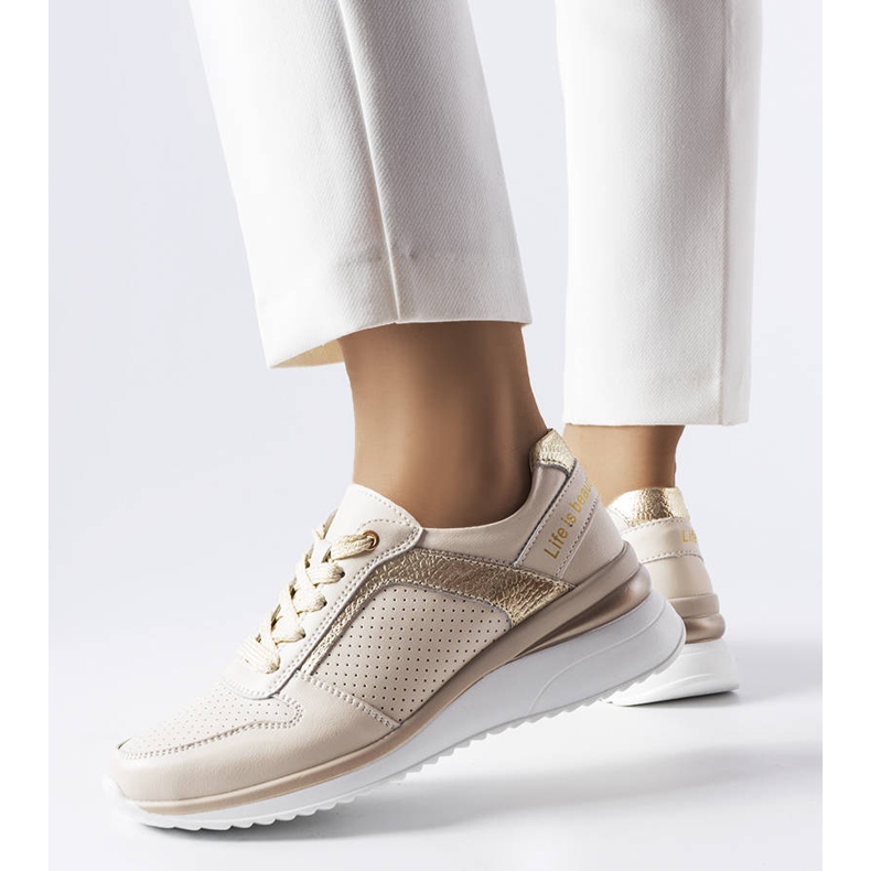 Scarpe in pelle traforata beige Trás 1