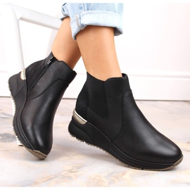 Sneakers con zeppa Rieker da donna in pelle nera nero 1