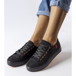 Sneaker in tessuto nero di Descoteaux 1