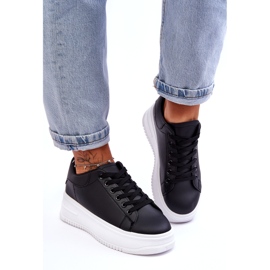 Scarpe sportive classiche da donna in bianco e nero 1