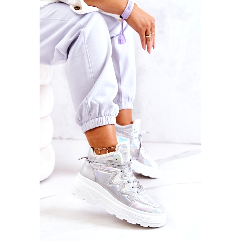 Scarpe sportive isolate da donna in argento 1