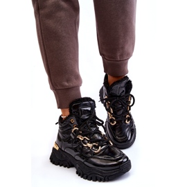 Stivali da trekking per scarpe sportive isolate da donna con una catena dorata nera nero 4