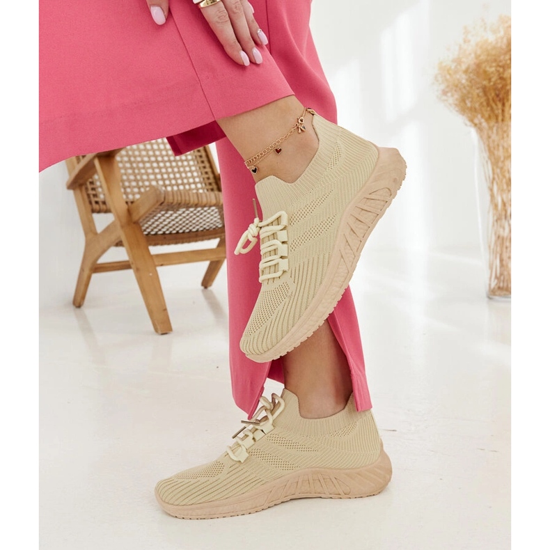 Sneakers in tessuto beige di Ornella 1