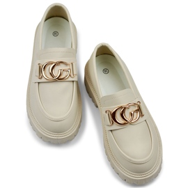 Mocassini beige sulla piattaforma e mocassini beige da donna 1