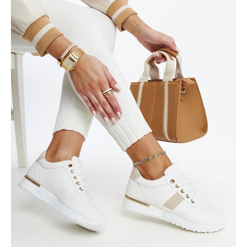 Sneakers bianche e beige sulla piattaforma in gomma Nihad bianca 1