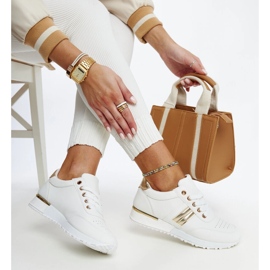 Sneakers bianche e oro sulla piattaforma in gomma Nihad bianca 1