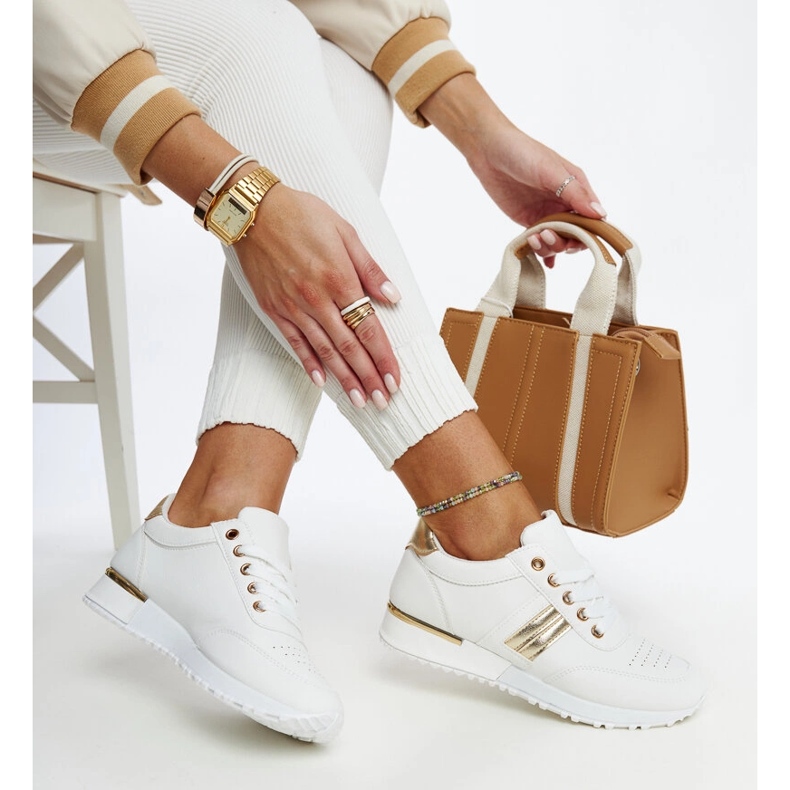 Sneakers bianche e oro sulla piattaforma in gomma Nihad bianca 1