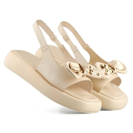 Sandali da donna beige con fiocco in orsetto sulla zeppa 1