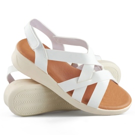 Comodi sandali bianchi da donna con zeppa bassa bianca 1