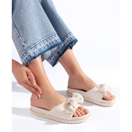 Ciabatte beige con fiocco 1