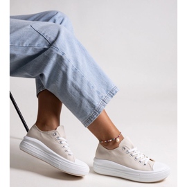 Scarpe da ginnastica beige su una spessa piattaforma Zlata 1