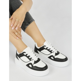 Scarpe sportive da donna nere con plateau nero 1