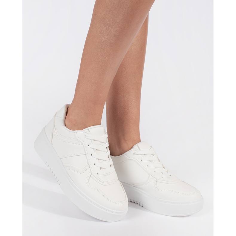 Scarpe sportive da donna bianche con plateau bianco 1