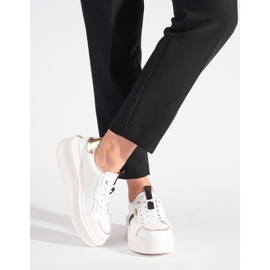Sneakers in pelle bianca con plateau 1