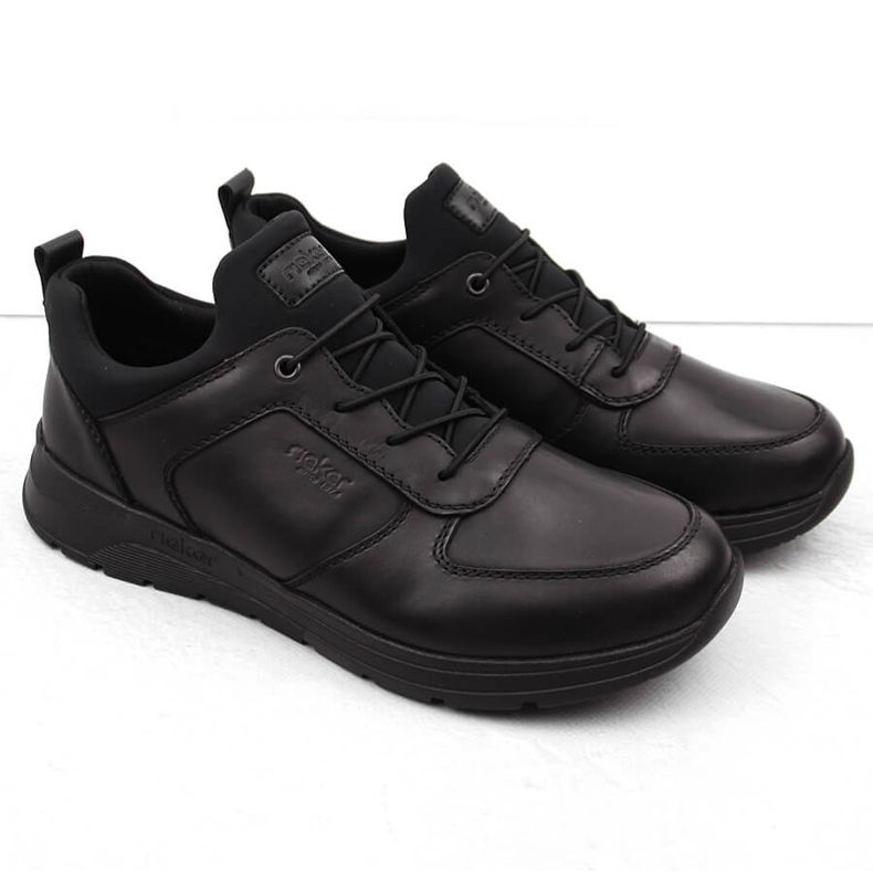 Comode scarpe slip-on da uomo nere in pelle Rieker 39653-00 nero 1