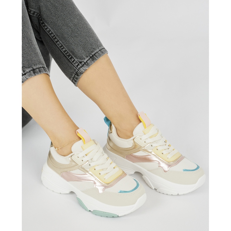 Scarpe sportive da donna con suola spessa d'oro 1