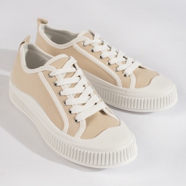 Sneakers beige con plateau da donna 1