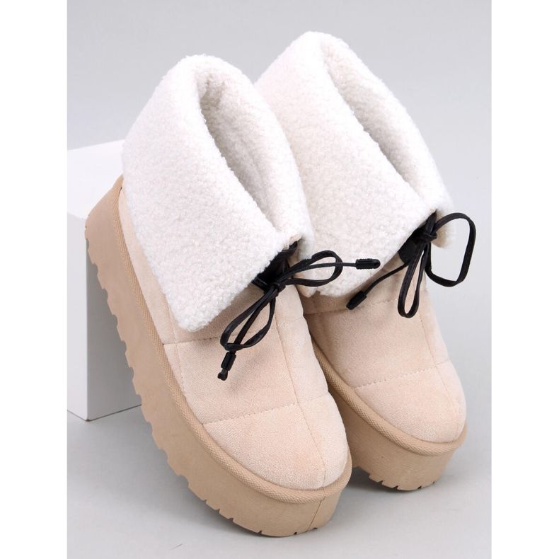 Prezzo Stivali in montone beige 1
