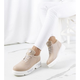 Sneakers sportive da donna beige sulla piattaforma 1
