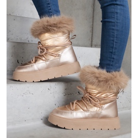 Doposci da donna isolanti beige con pelliccia d'oro 1