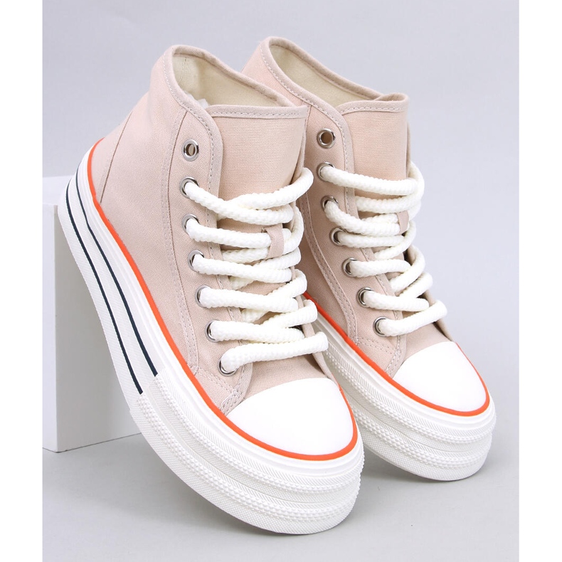 Sneakers da donna sulla piattaforma beige 1