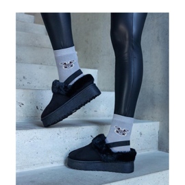 Pantofole nere con plateau decorate con pelliccia e con fascia elastica sul tallone nero 1