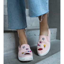 Sneakers in tessuto rosa con toppe 1