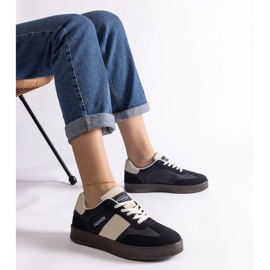 Sneakers nere con plateau e cuciture nero 1