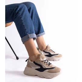 Sneakers da donna beige e nere 1