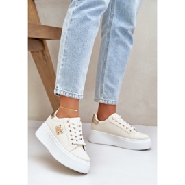 Sneaker femminili sulla piattaforma beige e oro 2