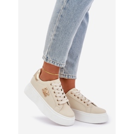 Sneaker femminili sulla piattaforma beige e oro 1