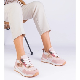 Sneaker rosa sulla piattaforma decorate con glitter 2