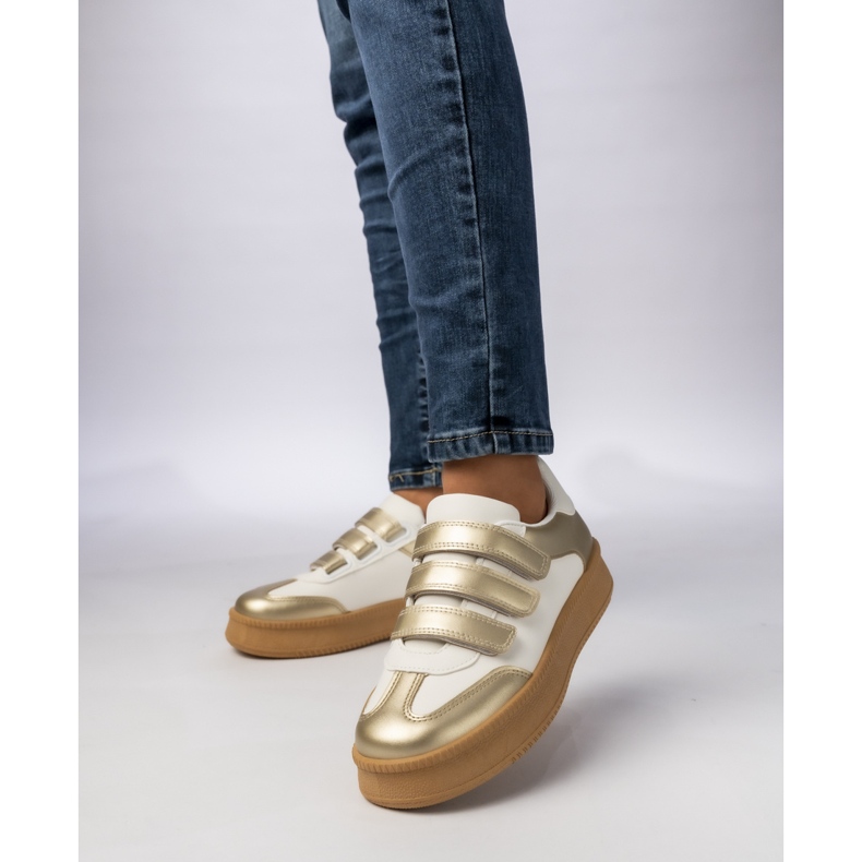 Sneaker metalliche d'oro femminile 1